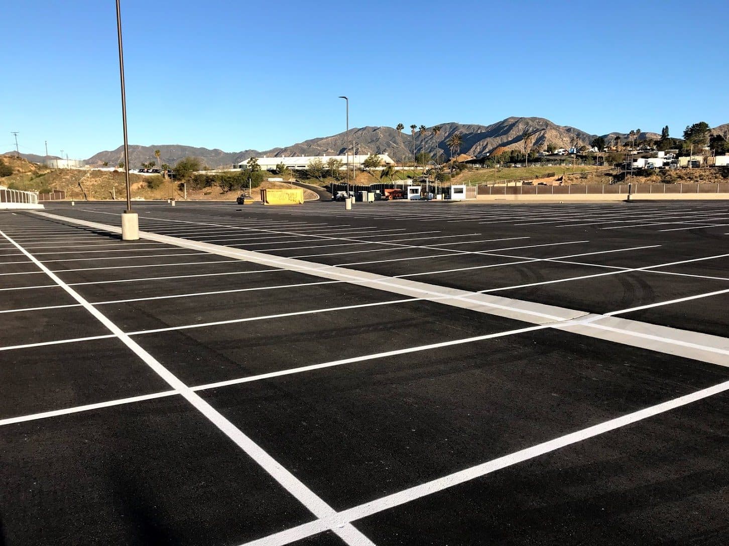 Crisp new stall striping on a fresh lot