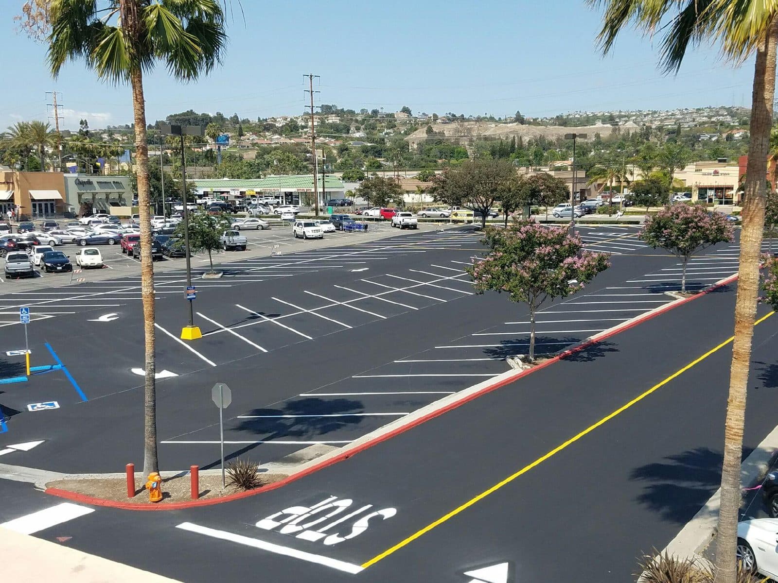 Shopping-center layout with a STOP legend and freshly painted stalls