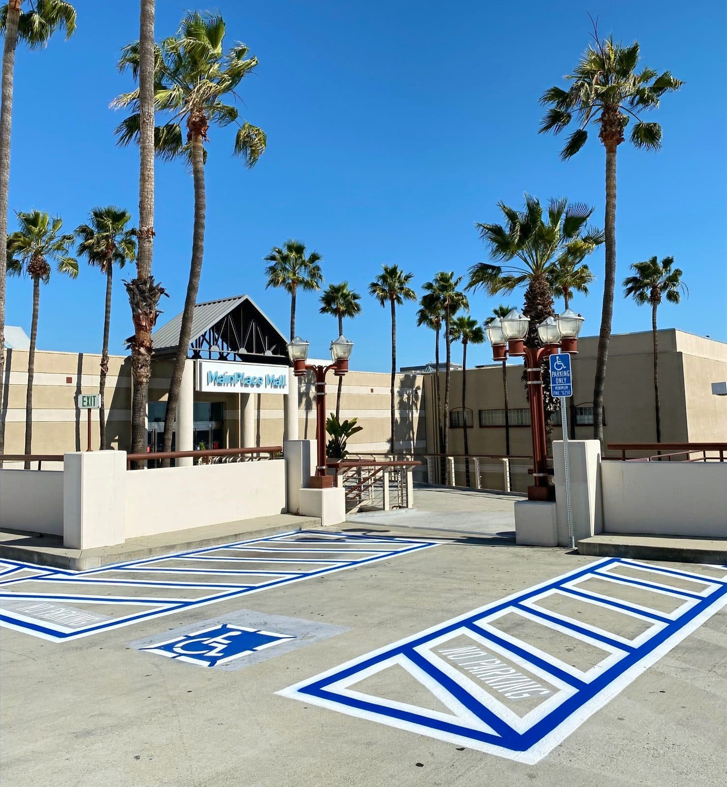 Mall entrance with ADA hatching and a directional layout