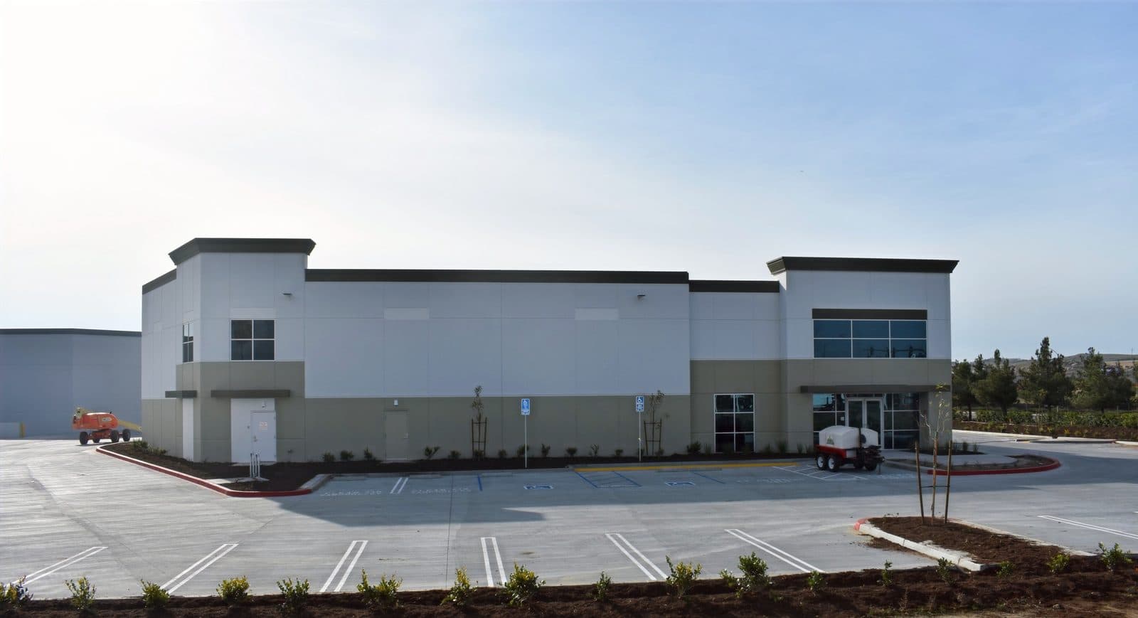 New commercial building with a freshly striped lot